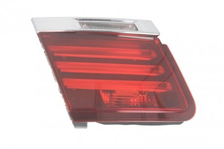 Задний фонарь левая (внутренняя часть, H21W, цвет стекла красный, светло противотуманных фар, светло заднего хода) BMW 7 F01, F02, F03, F04 Седан 5D 06.08-12.15 MAGNETI MARELLI 714027000706