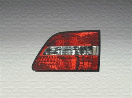 Задний фонарь левая (внутренняя часть, цвет стекла красный, свет противотуманных фар, свет заднего хода) FIAT STILO Универсал 10.01-09.04 MAGNETI MARELLI 714028180701