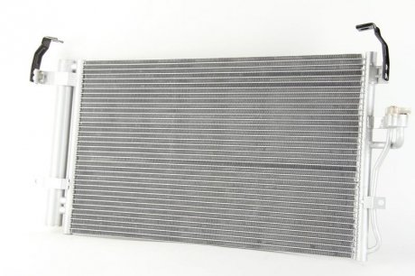 Радиатор кондиционера (с осушителем) HYUNDAI COUPE, ELANTRA, LANTRA II 1.5-2.7 11.95-08.09 THERMOTEC KTT110223 (фото 1)